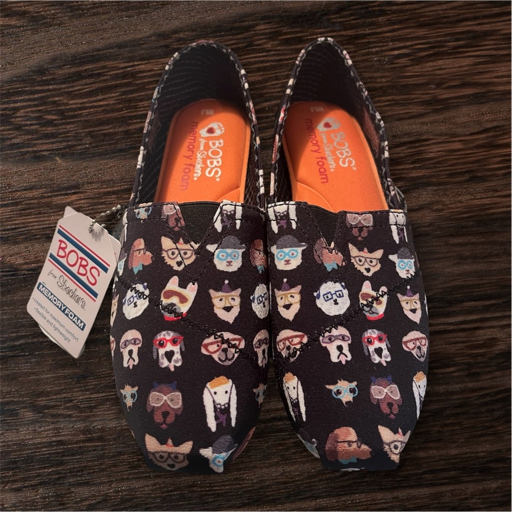 Skechers Bobs Black Slip-Ons with Dog Design